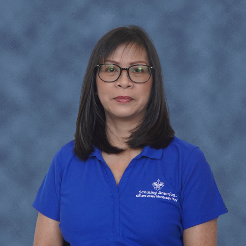 A person wearing a blue polo shirt with a logo for Scouting America, Silicon Valley Monterey Bay.