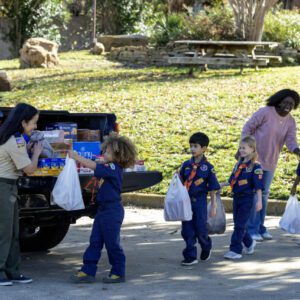 Young Scouts working together on a community service activity