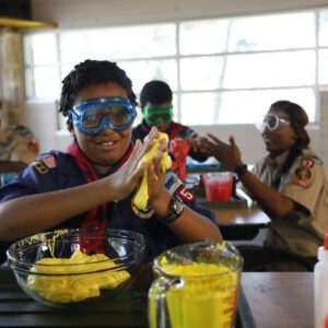 Scouts collaborating on a hands-on STEM activity