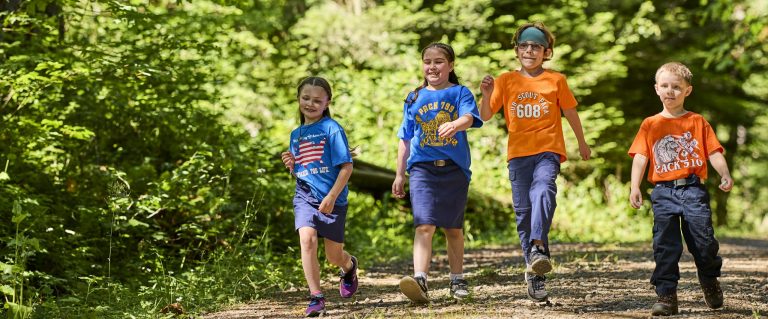 Cub Scouts hiking on a trail